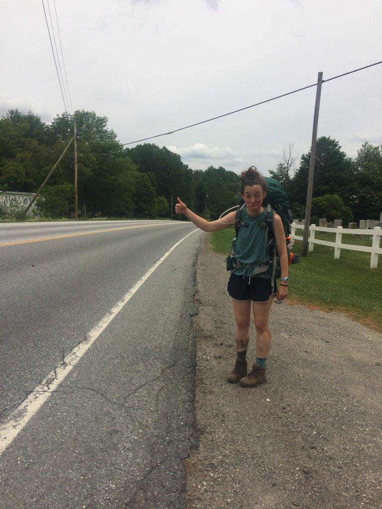 Hitchhiking, with conviction.
